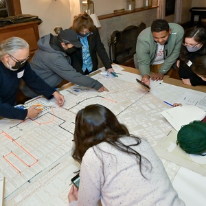 The USC Trees Team at a community engagement event in University Park asking residents to identify routes they wish to see more trees on